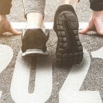 Runner on a starting line that says 2021